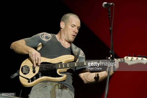 88554203-bass-player-tim-commerford-of-american-band-gettyimages.webp