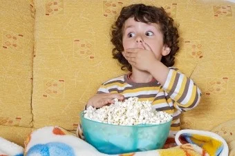 child_eating_popcorn.webp