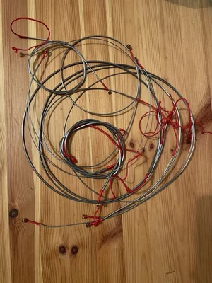 Flatwound Sets + Einzelsaiten (La Bella FS 45-105, Thomastik JF 44-135, Ernie Ball 50 - 100)