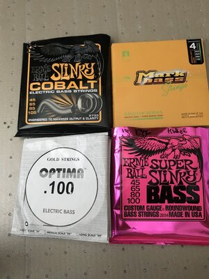 4 Saiter Ernie Ball Cobalt, Markbass Croove, Optima Gold, EB Slinky