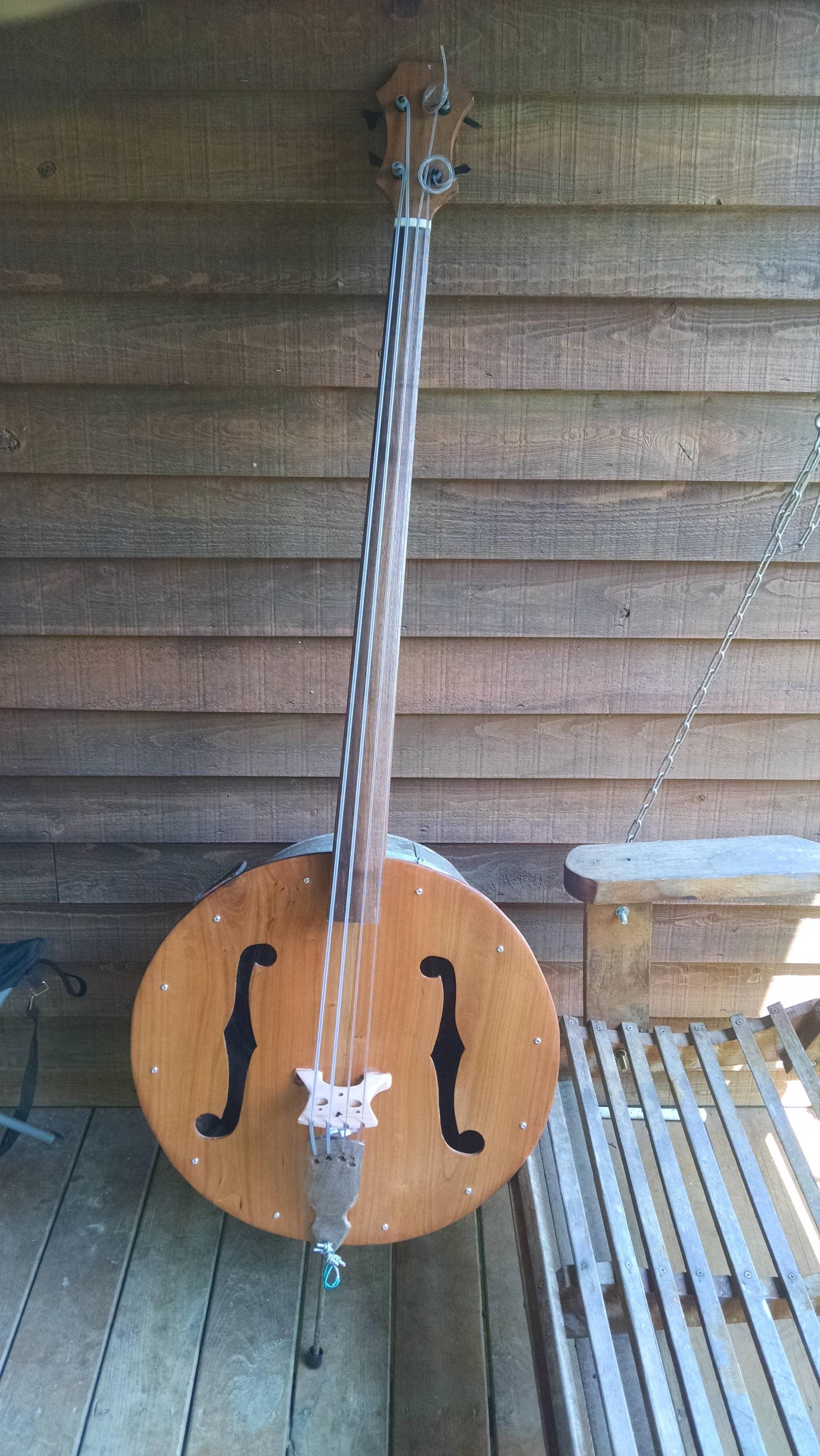Finished my new washtub upright bass • /r/pics | Upright bass, Homemade  instruments, Cigar box guitar