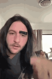 pull-tape-off-eyebrow-failarmy.gif