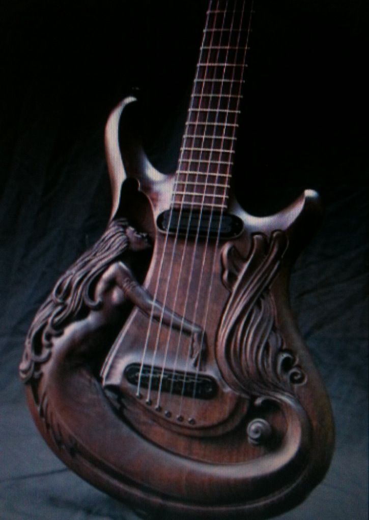 dae2b89ec3b7e484b223a1f4d805cce4--guitar-art-guitar-pics.jpg