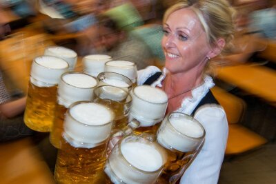 Über das Geheimnis des Maßkrug-Tragens auf dem Oktoberfest - Bier gefällig? Über das Geheimnis des Maßkrug-Tragens auf dem Oktoberfest - Bier gefällig?